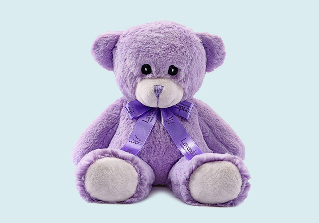 紫色領結泰迪熊玩(wán)具